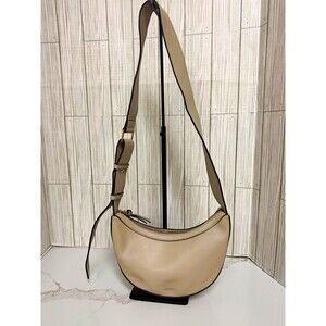 Oryany Beige Crescent Crossbody Bag Zip Top, Adjustable Strap